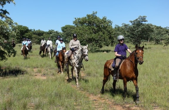 TWT Riders Janie Lulu and others walking through Jembisa